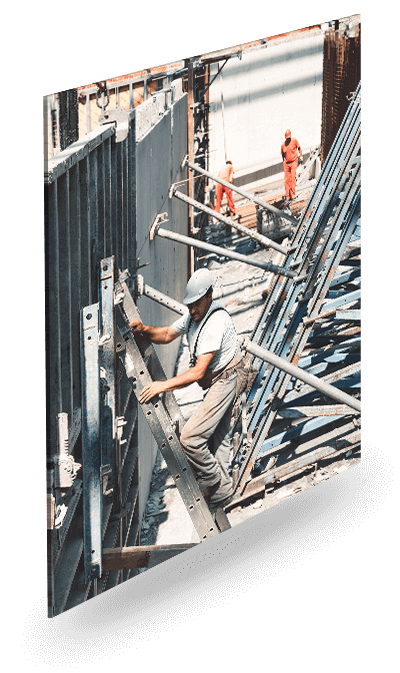 a-worker-climbing-a-ladder-at-a-construction-site